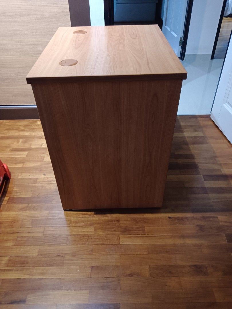 Study table (Category: Tables & Sets) located in Singapore. Submitted by tinazman (Listing ID 1341351674, Image 3). Description: - Sturdy wood table in pristine condition (no scratches/defects) - Perfect for small rooms/spaces - No dismantling required and easy to carry - Dimensions: 70 x 55 x 74cm - Cash & carry preferred but delivery can be arranged for a small fee.