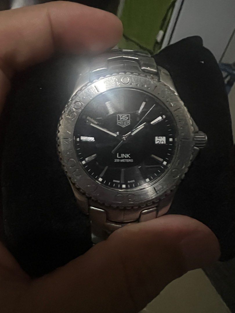 Tag Heuer Link orig (Category: Luxury Watches) located in Malabon City. Submitted by 168raymond (Listing ID 1341386592, Image 2). Description: Tag Heuer Link 200 Meters Swiss Made Quarts Movement orig Tag Good Working Minor scraches Location Potrero malabon Meetup near place .