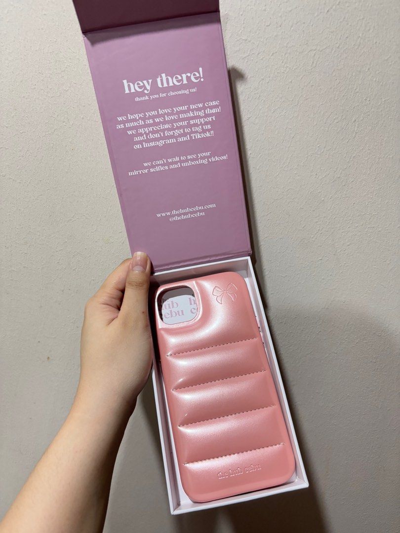 The Cebu Hub Puffer Case in Hailey Iphone 15plus Case (Category: Cases & Sleeves) located in Quezon City. Submitted by clairelouiseb (Listing ID 1341358141, Image 1). Description: • Has minimal dents (kindly swipe to see the dents) Payment: Bank transfer through Gcash or online payment through any bank account ☺️ I only do same day delivery: Lalamove/Grab 📍QC .