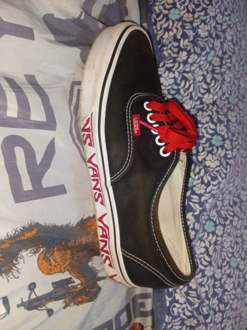 Vans black shoes with red lace (Category: Sneakers) located in General Trias. Submitted by lynnlabs (Listing ID 1341318895, Image 2). Description: Vans black shoes with red lace and printed red vans on the soles. original.