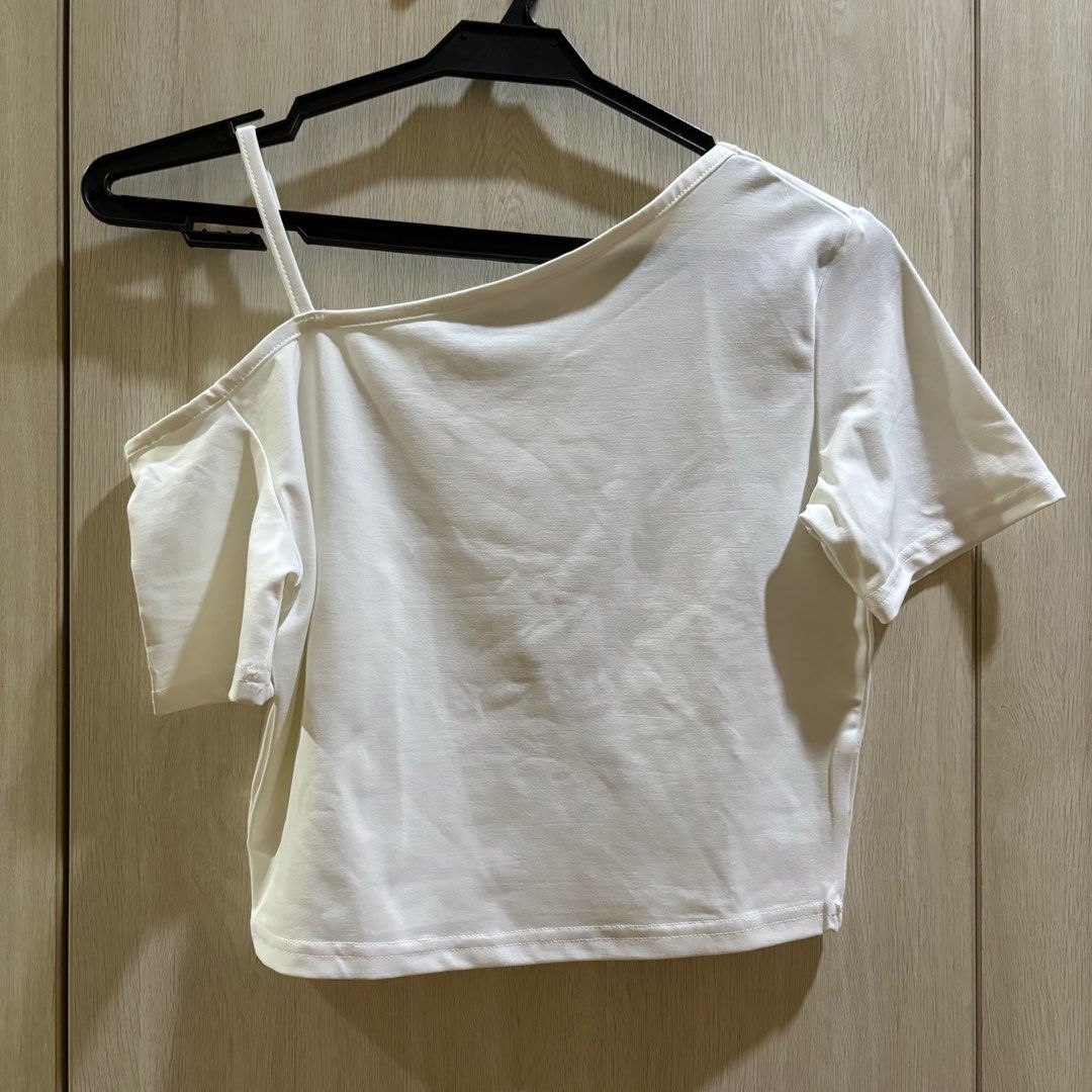 White Asymmetrical One Sided Strap Tshirt Crop Top (Category: Blouses) located in Quezon City. Submitted by ddeonz (Listing ID 1341277853, Image 1). Description: .