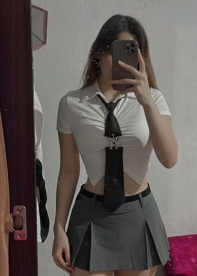 White top with neck tie (Category: Blouses) located in San Antonio. Submitted by lalisachu (Listing ID 1341340855, Image 2). Description: Pwede pang concert fit Xs-s.