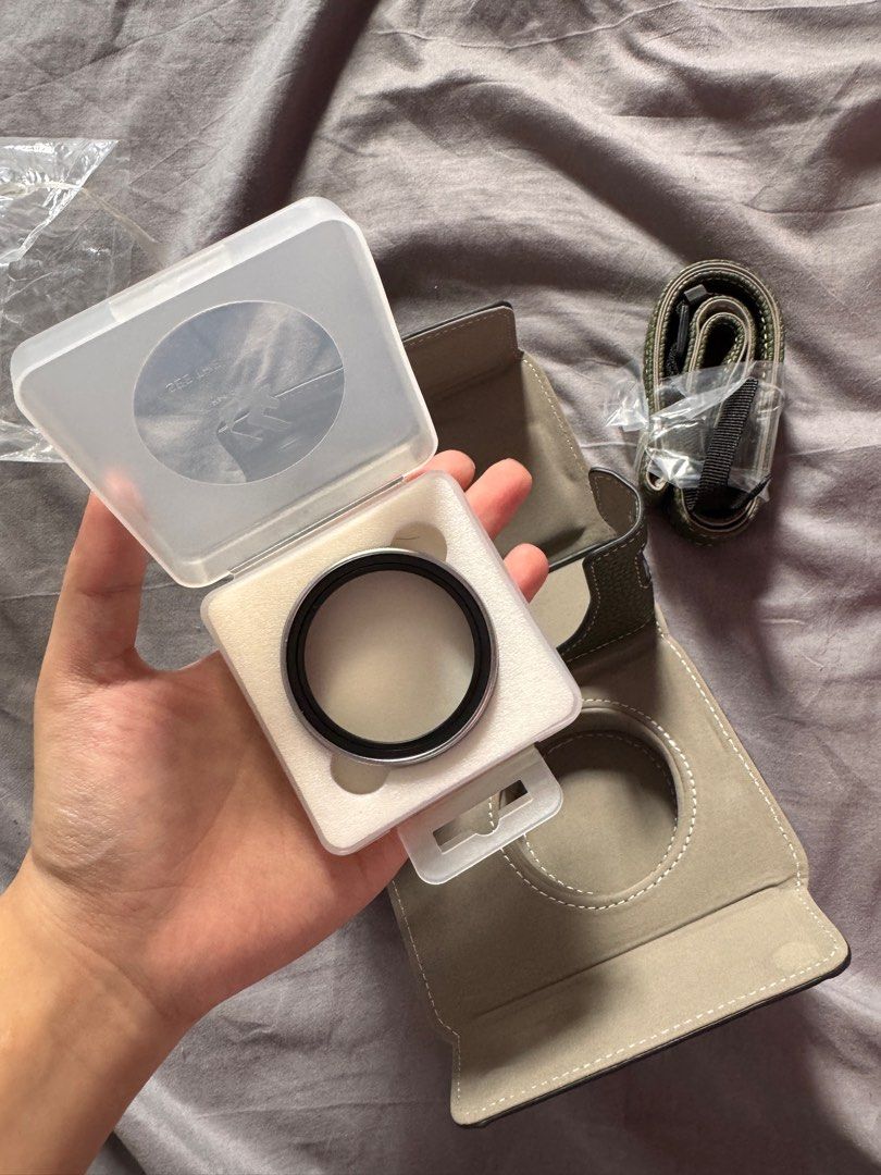 X100VI Accessories (Category: Camera Bags & Carriers) located in Paranaque City. Submitted by eleycruz (Listing ID 1341256425, Image 3). Description: ONHAND Tried only, not used outside PU Camera Case K&F Concept UV Lens Filter 1700 Bundle Price case only: 800 lens only: 1,000 LOC: Parañaque Rfs: spares, opted for different brand.