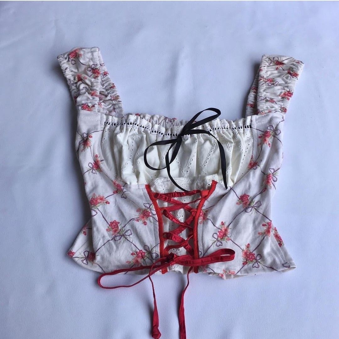 Anmade Coquette Ribbon Red Cropped Top (Category: Sleeveless) located in Pasig City. Submitted by angelsonarainbow (Listing ID 1341546735, Image 3). Description: 🩷 This item is available unless marked sold🩷 ᡣ𐭩 ｡ꪆৎ ˚⋅ Angels on a Rainbow ITEM CODE: Vivian Top Waist: 26-32" Length: 10" Notes: ♥︎ Originally bought for ₱950 + SF ♥︎ Uneven ribbon detailing ♥︎ Most insanely rare ribbon fabric ₱300 ♡ Buy 2 or more items: Get a bundle discount! ♡ Colo