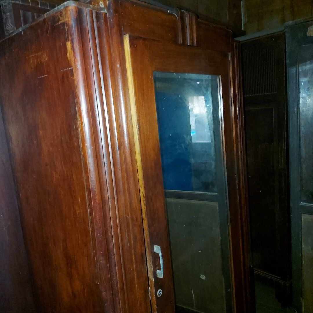 ANTIQUE NARRA CABINET/APARADOR (Category: Shelves, Cabinets & Racks) located in Manila. Submitted by georgina123place (Listing ID 1341532015, Image 2). Description: READY TO USE CABINET. A LITTLE CLEANING AND WAXING NEEDED . NOTHING TO REPAIR EXCEPT THAT YOU HAVE TO CHANGE THE KEY LOCK. MIRROR IS INTACT. WHOLE BODY ( FRONT & BACK ) IN GOOD CONDITION. BEAUTIFUL CROWN AND FEET..