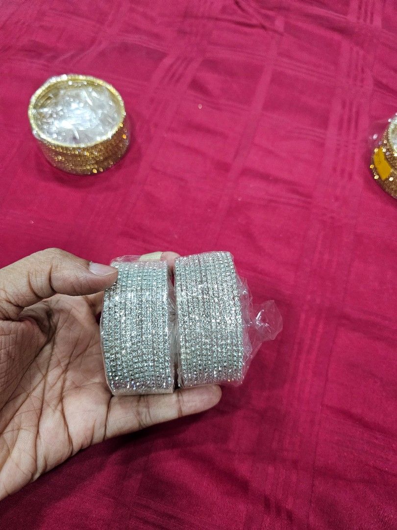 Bangles (Category: Accessory holder, box & organizers) located in Singapore. Submitted by djsidifjdk (Listing ID 1341571435, Image 3). Description: silver colour with stones 1 pack 12 pic total 2 pack each $10 size 2.4.