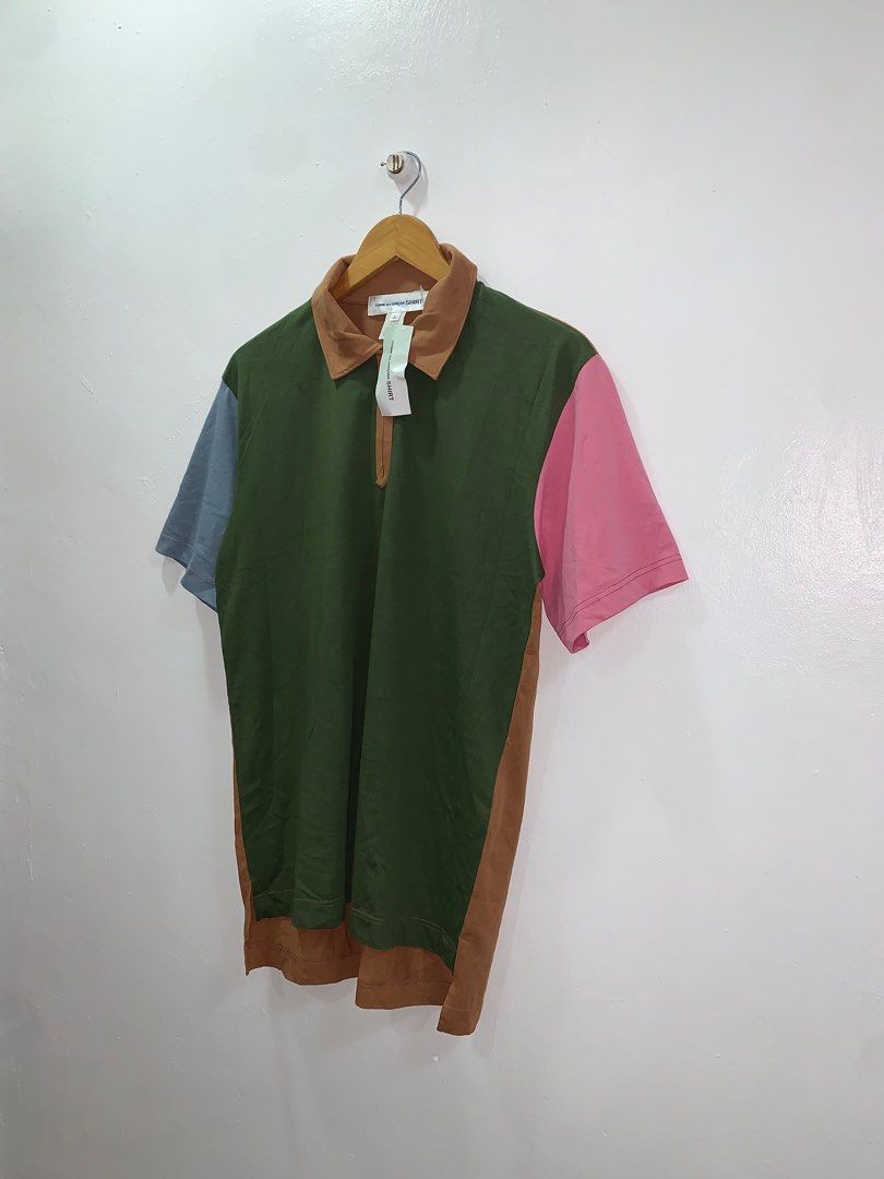 COMME des GARÇONS SHIRT COLOUR MIXED - ZIPPED POLO SHIRT (Category: Tshirts & Polo Shirts ) located in Cavite. Submitted by ___layern0ne (Listing ID 1341499696, Image 2). Description: Tagged Size: L Armpit to Armpit: 21.2 inches Length: 28 inches (front) | 30 inches (back) Measured laid flat and a bit stretched | Stretchable material Never worn | Still with tag | No major flaws Slightly wrinkled due to storage .
