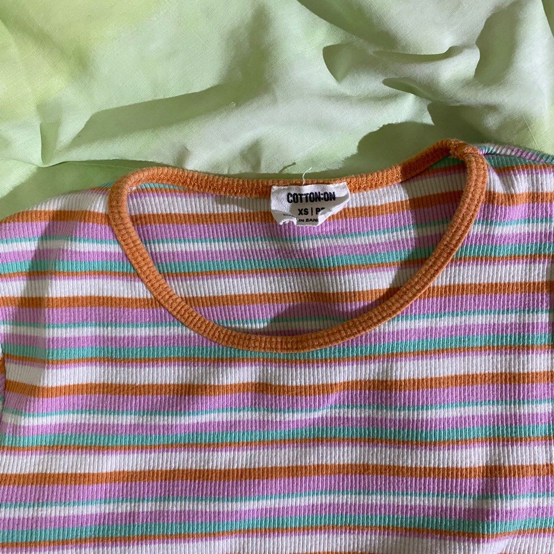 Cotton On colorful striped top (Category: Announcements) located in Cebu City. Submitted by ahbigil (Listing ID 1341515424, Image 3). Description: Note: The photos that are posted are actual photos of the product/s. Colors may vary due to lighting conditions. -Cotton On -rarely worn -GOOD AS BRAND NEW -still in great shape and quality -fits XS-Small frames -not cropped so it's perfect for school/conservative occasions -Great quality Selling this 
