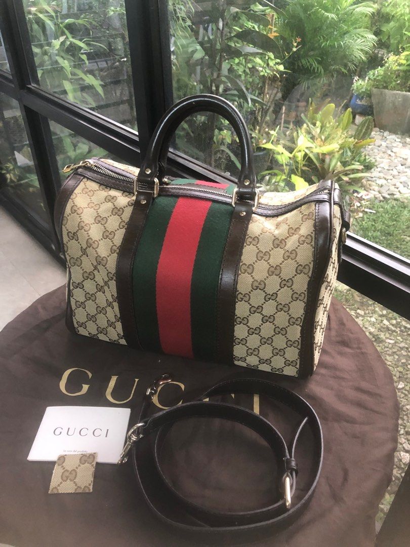 Gucci Boston Web Authentic (Category: Luxury Bags & Wallets) located in Manila. Submitted by heysential (Listing ID 1341497357, Image 1). Description: Gucci Boston Web design M Canvas with light flaws in the leather . Perfect bag for traveling . Authentic. Purchased from abroad. No bogus buyer Pls. .