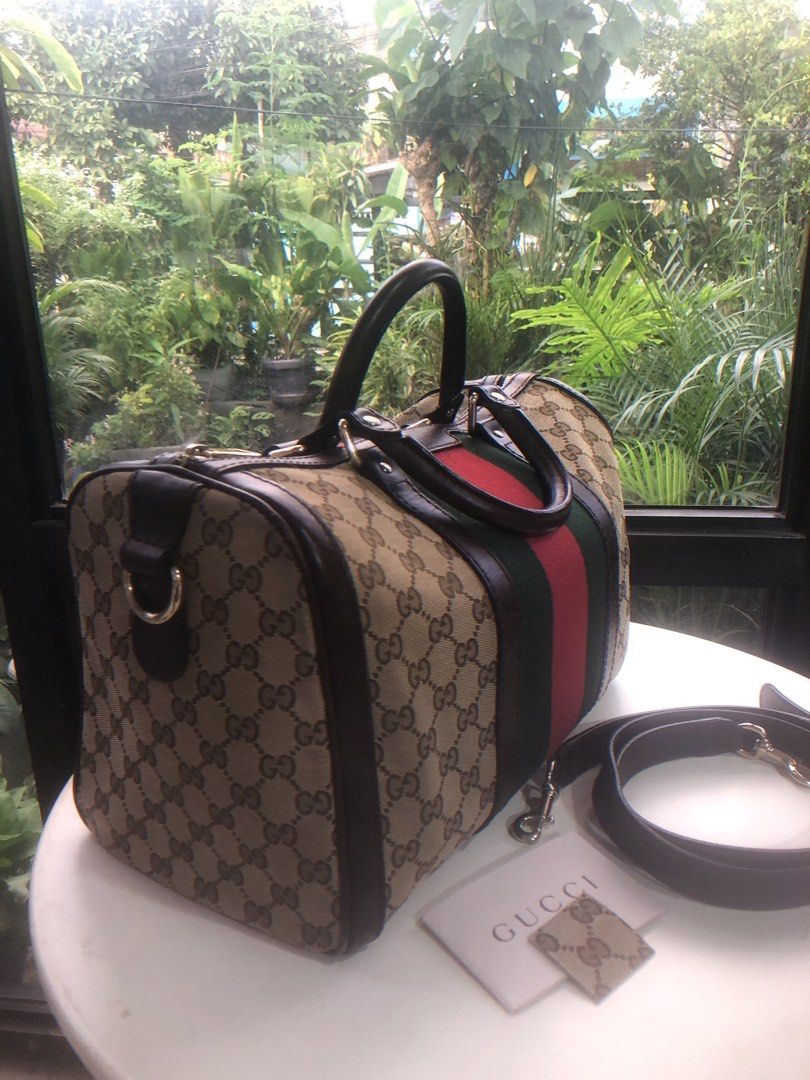 Gucci Boston Web Authentic (Category: Luxury Bags & Wallets) located in Manila. Submitted by heysential (Listing ID 1341497357, Image 2). Description: Gucci Boston Web design M Canvas with light flaws in the leather . Perfect bag for traveling . Authentic. Purchased from abroad. No bogus buyer Pls. .