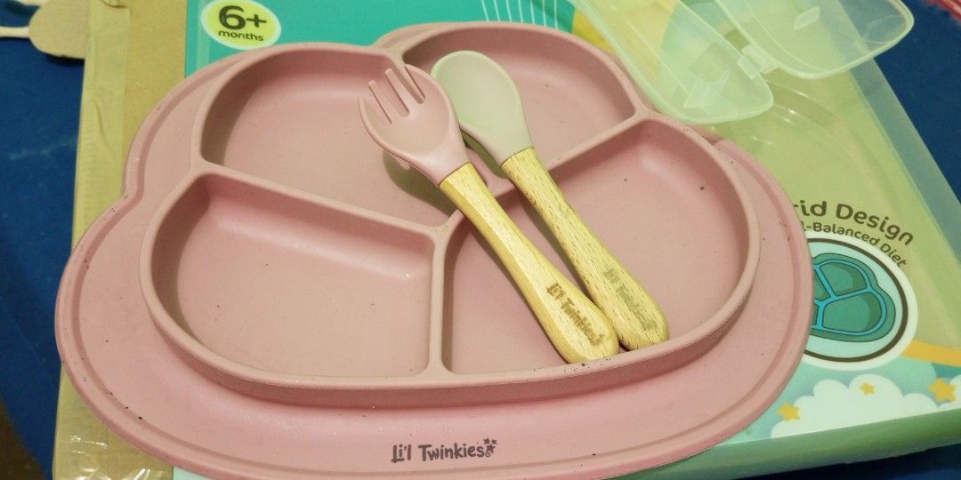 Li'l twinkies silicone dish plate (Category: Weaning & Toddler Feeding) located in Navotas City. Submitted by roxieclzb (Listing ID 1341496532, Image 3). Description: li'l twinkies silicone dish plate with train me spoon and fork set with packaging and box pa po. issues: faded color dish plate and spoon (of course always ginagamit for feeding 😊) original price now 900++.