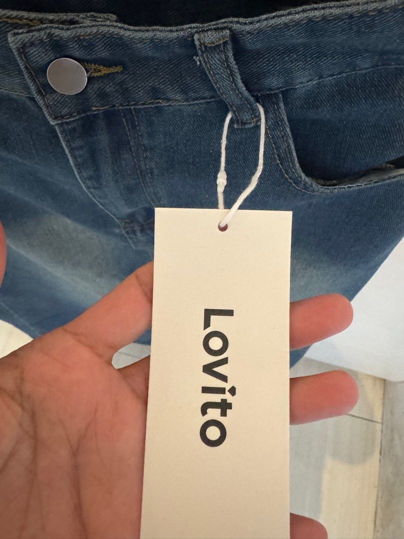 Lovito Denim Skirt - front slit with tag (Category: Skirts) located in Makati City. Submitted by chaseyourdreams2014 (Listing ID 1341457807, Image 2). Description: Brandnew Size Large on tag With tags pa I can send more photos DM me.