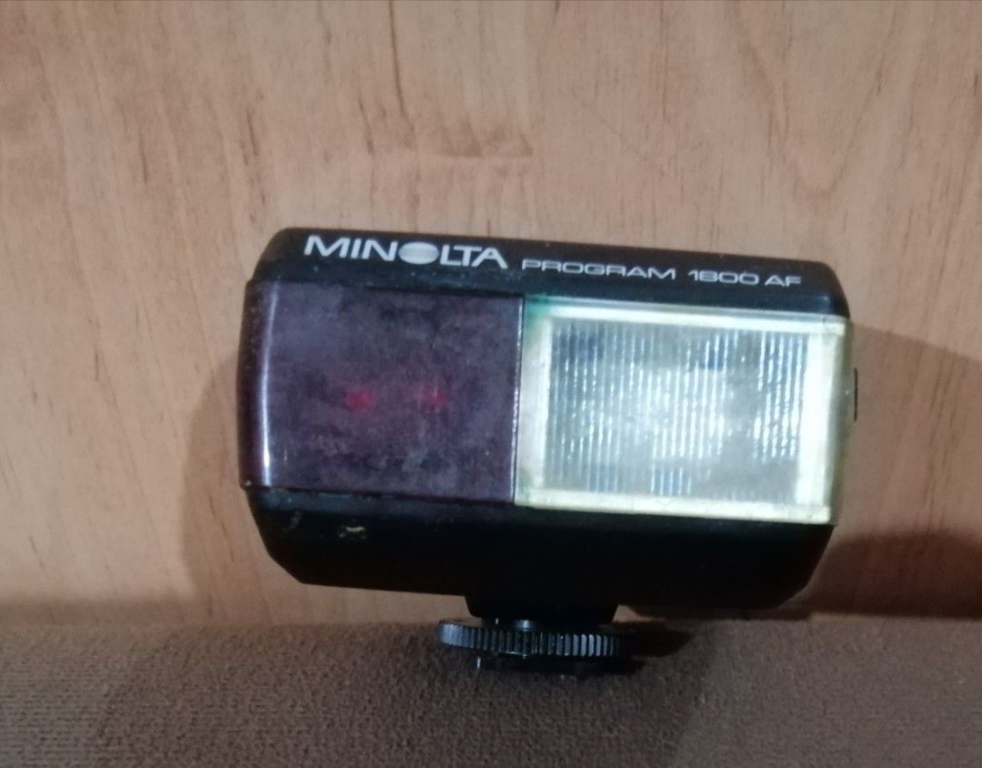 Minolta program 1800 AF retro cam flash 1980s (Category: Flashes) located in Quezon City. Submitted by goldencity1964 (Listing ID 1341417386, Image 1). Description: Selling retro camera electronic flash MINOLTA PROGRAM 1800 AF UNTESTED..SELLING AS IS WYSIWYG SCAN PIC FOR CONDITION FOR RETRO CAMERA ENTHUSIASTS GREAT ADDITION TO YOUR CAMERA COLLECTION GREAT GIFT FOR CAMERA COLLECTOR TEXT FOR MEET UP.