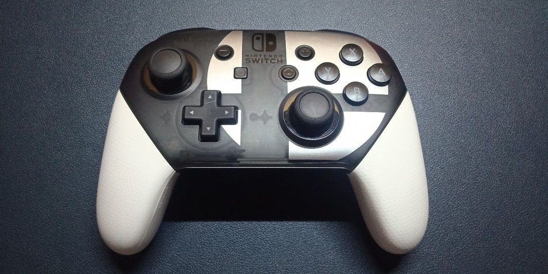 Nintendo Switch Pro Controller (Category: Controllers) located in Rizal. Submitted by midowsuji (Listing ID 1341561184, Image 2). Description: SSBU Edition (101% Original) buksan pa natin kung may duda ka. No issue, test to sawa dala ka lng ng Switch mo for testing. Loc. Taytay Rizal.