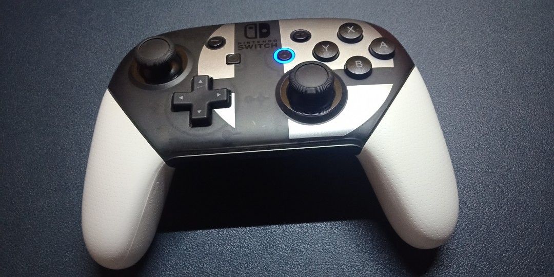 Nintendo Switch Pro Controller (Category: Controllers) located in Rizal. Submitted by midowsuji (Listing ID 1341561184, Image 1). Description: SSBU Edition (101% Original) buksan pa natin kung may duda ka. No issue, test to sawa dala ka lng ng Switch mo for testing. Loc. Taytay Rizal.