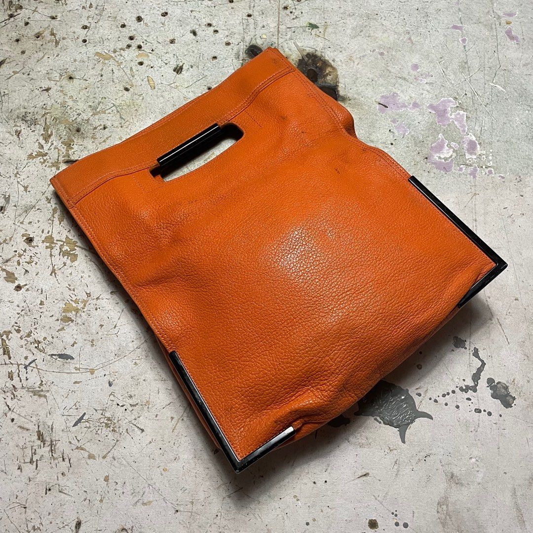 PHILIP LIM ORANGE SCOUTE FOLDOVER CLUTCH BAG (Category: Luxury Bags & Wallets) located in Manila. Submitted by revise.ph_ (Listing ID 1341523791, Image 3). Description: PHILIP LIM ORANGE SCOUTE FOLDOVER CLUTCH BAG Made in Dimension Length/Height:10-16.5 Width:13.5 Side Width: issue:MISSING SLING , Scratches & dirt Price:3,500 Free shipping via JNT.