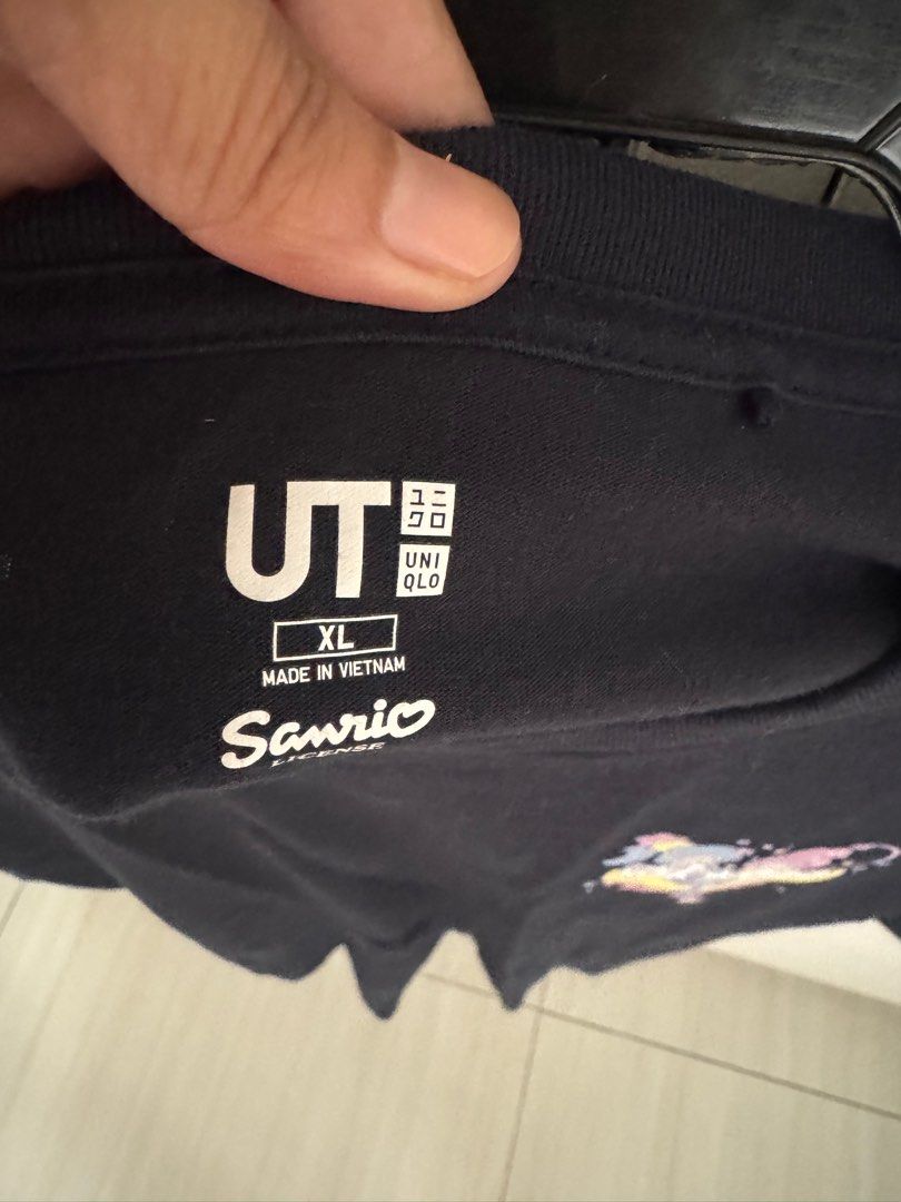 Uniqlo Sanrio Shirt (Category: Shirts) located in Makati City. Submitted by chaseyourdreams2014 (Listing ID 1341458029, Image 2). Description: Size XL on tag Dark navy color Good condition DM.