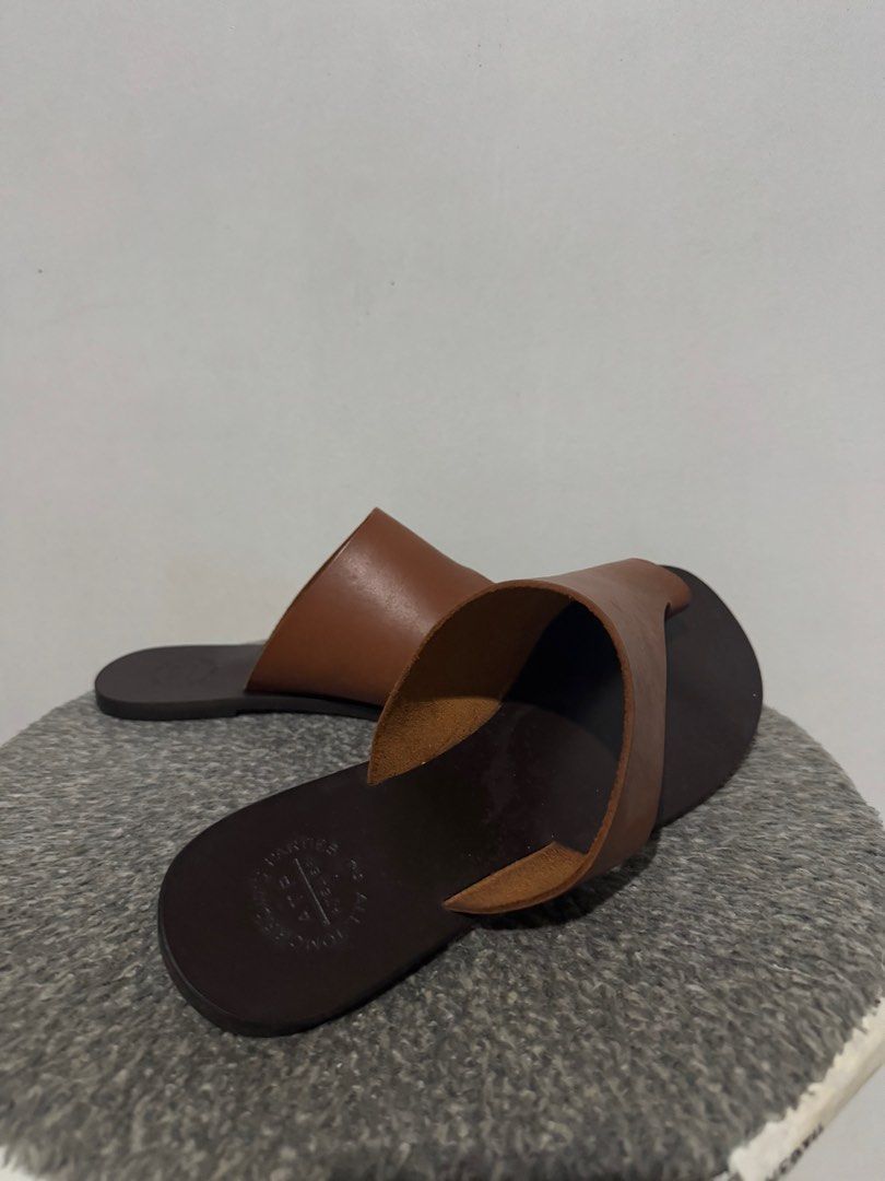 ATP atelier brown cutout sandals (Category: Flats & Sandals) located in Manila. Submitted by heather0127 (Listing ID 1341719065, Image 3). Description: Negotiable. Real price when brand new is around 13.5k. Has minor flaws that can be removed when cleaned. RFS: Decluttering .