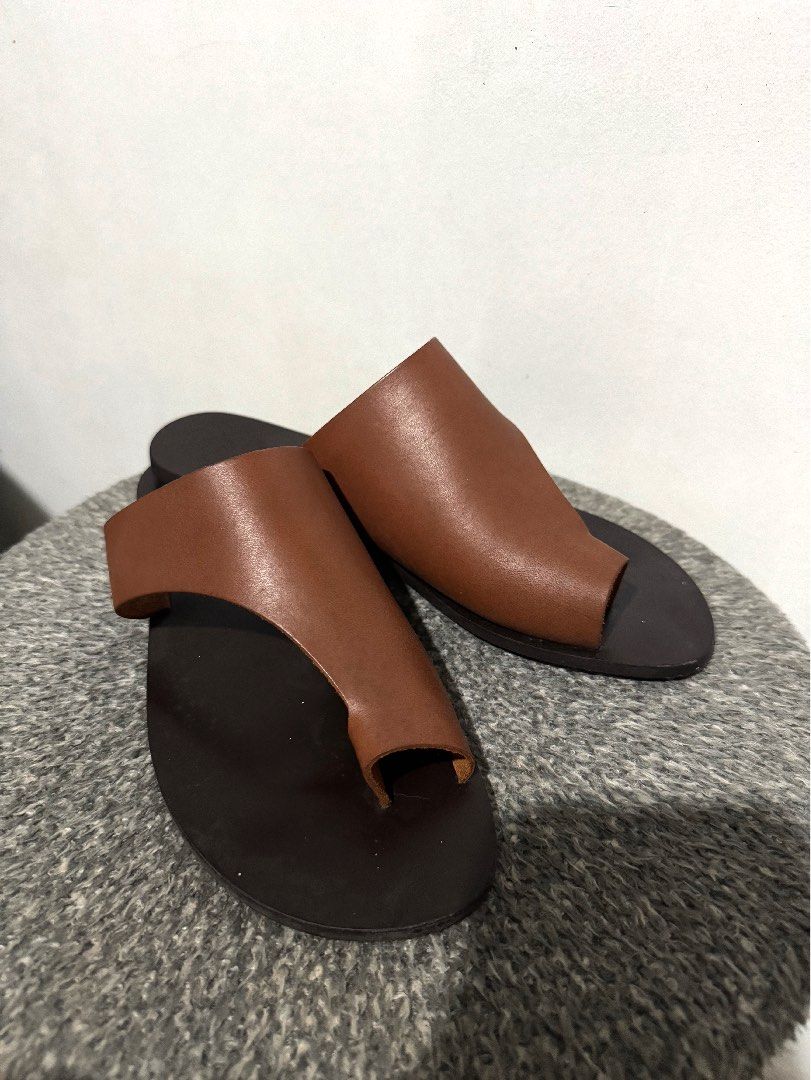ATP atelier brown cutout sandals (Category: Flats & Sandals) located in Manila. Submitted by heather0127 (Listing ID 1341719065, Image 1). Description: Negotiable. Real price when brand new is around 13.5k. Has minor flaws that can be removed when cleaned. RFS: Decluttering .