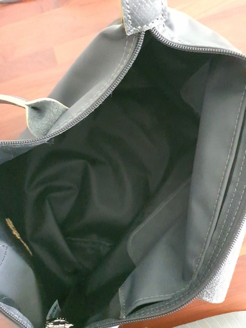 Authentic Longchamp Le Pliage Club Mini Bag - Limited Gun Metal Colour (Category: Bags & Wallets) located in Singapore. Submitted by madfish (Listing ID 1341689402, Image 3). Description: The bag includes a long shoulder strap..