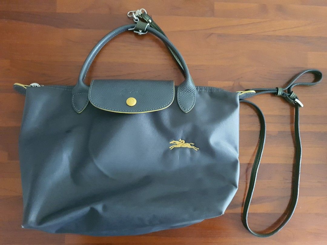 Authentic Longchamp Le Pliage Club Mini Bag - Limited Gun Metal Colour (Category: Bags & Wallets) located in Singapore. Submitted by madfish (Listing ID 1341689402, Image 1). Description: The bag includes a long shoulder strap..