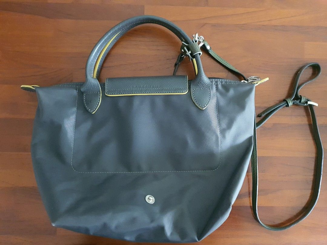Authentic Longchamp Le Pliage Club Mini Bag - Limited Gun Metal Colour (Category: Bags & Wallets) located in Singapore. Submitted by madfish (Listing ID 1341689402, Image 2). Description: The bag includes a long shoulder strap..