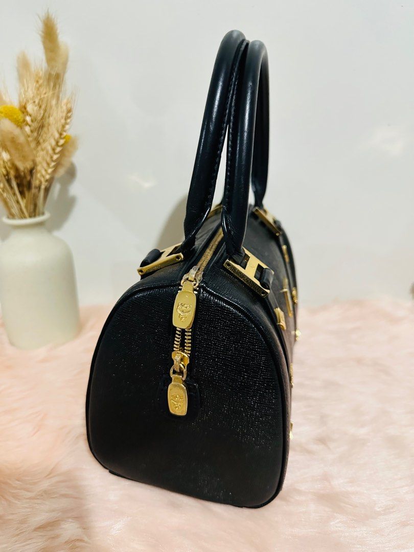 Authentic MCM Small Boston Doctors Bag (Category: Luxury Bags & Wallets) located in Porac. Submitted by bagitupshopph (Listing ID 1337789019, Image 2). Description: MCM Small Boston Bag in Saffiano Grained Leather Gold hardware Still in good condition Kindly manage your expectations as this is a pre-loved bag. Has minor signs of usage For more pics, pm me..