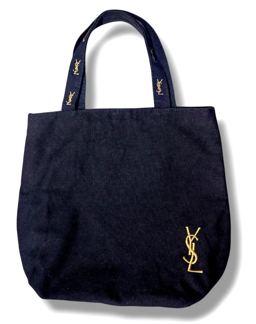 Authentic YSL canvas tote bag (Category: Luxury Bags & Wallets) located in Donsol. Submitted by saksthriftavenuebyluckymaria8 (Listing ID 1341738182, Image 1). Description: excellent used condition no holes no stains 15in x 4in x 13in 7in handle drop.