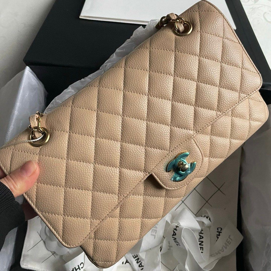 Chanel Classic Flap Medium Beige GHW Caviar (Category: Luxury Bags & Wallets) located in Quezon City. Submitted by __12345 (Listing ID 1341732554, Image 1). Description: - Preorder (2 weeks eta) - 9/10 condition - Series 14 - Includes, box, dustbag, hologram, and entrupy cert - Available for meet ups/delivery - Detailed photos available upon request - Guaranteed authentic or money back! Open to sourcing requests! Send us a message 💌🛍️.