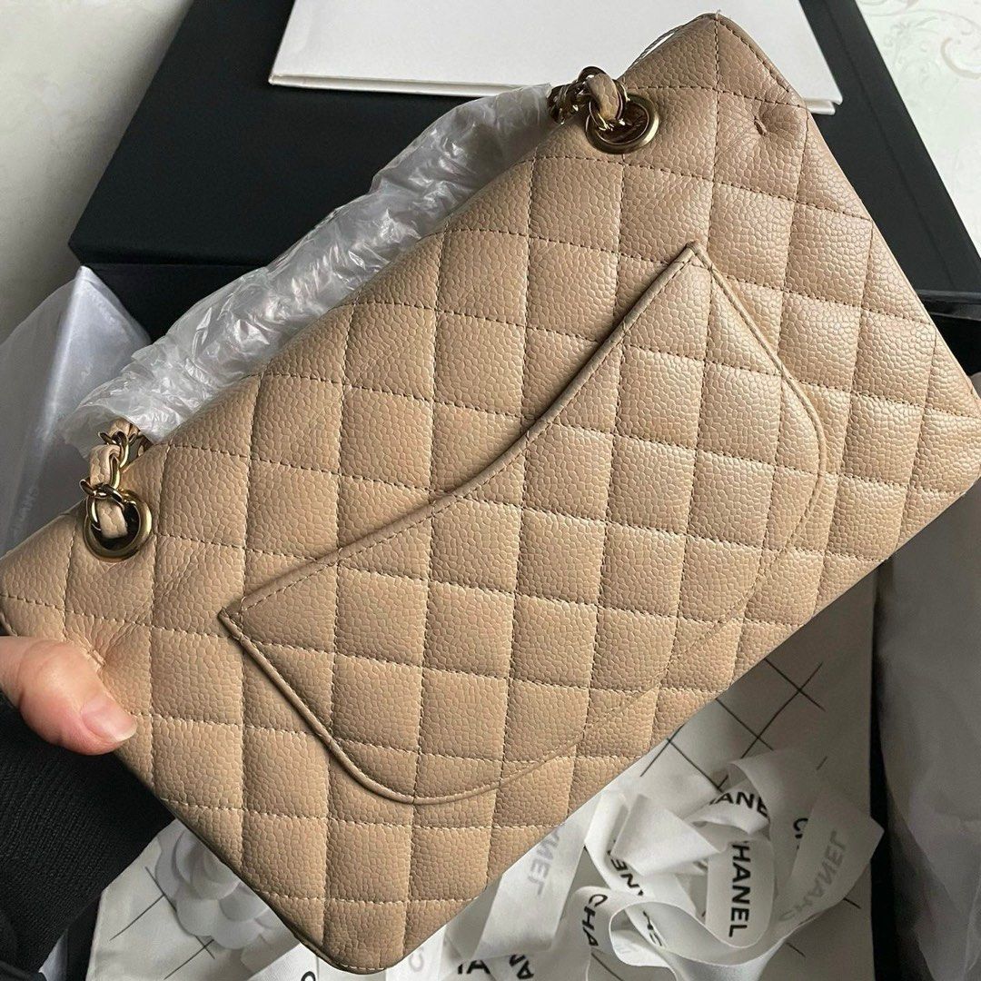 Chanel Classic Flap Medium Beige GHW Caviar (Category: Luxury Bags & Wallets) located in Quezon City. Submitted by __12345 (Listing ID 1341732554, Image 3). Description: - Preorder (2 weeks eta) - 9/10 condition - Series 14 - Includes, box, dustbag, hologram, and entrupy cert - Available for meet ups/delivery - Detailed photos available upon request - Guaranteed authentic or money back! Open to sourcing requests! Send us a message 💌🛍️.
