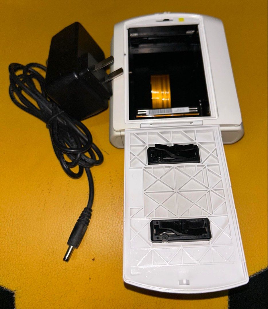FUJIFILM Share SP1 Instax Printer (Category: Printers, Scanners & Copiers) located in Quezon City. Submitted by prelovedbyhjm (Listing ID 1341741389, Image 2). Description: FOR YOUR CONCERT MEMORIES 💫💜 FUJIFILM Share SP1 Instax Printer 📌 Unit & charger only, natapon na yung box 📌 Like new pa. Dahil nakatambak lang at ilang beses lang nagamit Issue: no battery RFS: need cash, di na rin nagagamit (price is nego) Loc: North Caloocan (meet up / d