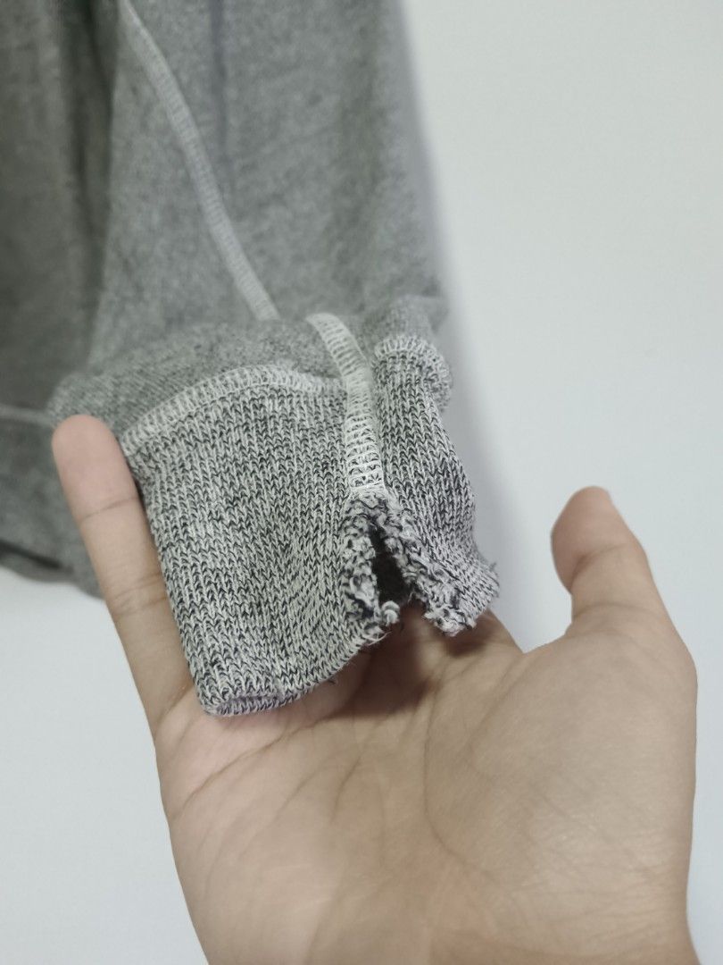 Gray distressed sweater (Category: Longsleeves) located in Caloocan City. Submitted by _c14rr (Listing ID 1341669398, Image 2). Description: w- 22" l - 26" +sf mop : gcash.