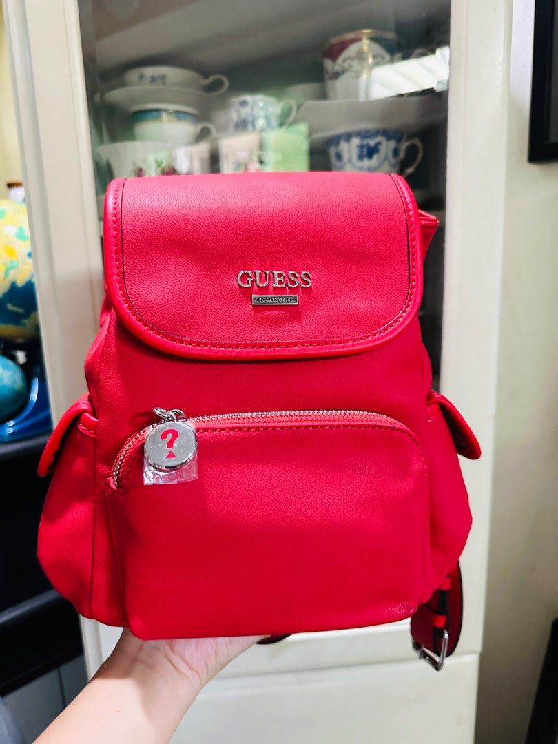 Guess Small Leather Red Backpack (Category: Backpacks) located in Manila. Submitted by th1234shop (Listing ID 1282398112, Image 2). Description: For Sale is Authentic Guess small backpack in real red color. MOP: BPI/BDO/Gcash MOD: JNT/Lalamove/Grab.