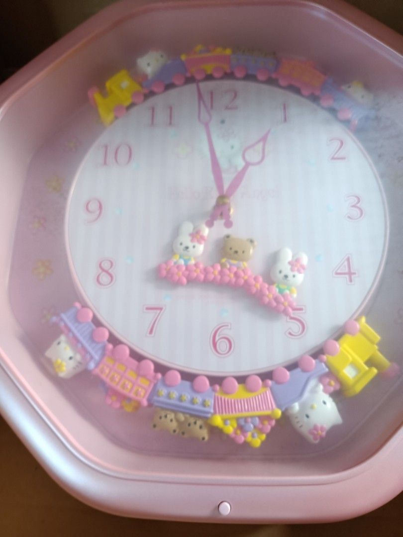 HELLO KITTY JAPAN - CITIZEN WALL CLOCK (Category: Clocks) located in Pasig City. Submitted by smcmj_preloved (Listing ID 1341622316, Image 3). Description: Hello Kitty Marionette Clock Code: M766 - 4MH766-013 Citizen Color: Pearl Pink Size: 37 X 37 X 10 cm Box Size: 43 X 43 X 14 cm Movement in Japan - Cased in China. Sold in Japan Only. This Citizen product is from 2000. I have kept this since I received it, part of my Hello Kitty Collections. Th
