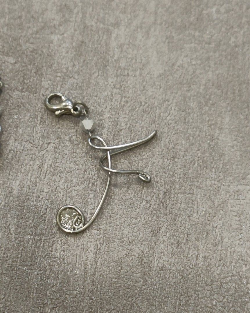Initial Pendent (Category: Handmade Craft) located in Singapore. Submitted by artiris (Listing ID 1341691063, Image 1). Description: Handmade with stainless steel wire, one of a kind. The price is for each initial. You're welcome for customizing..