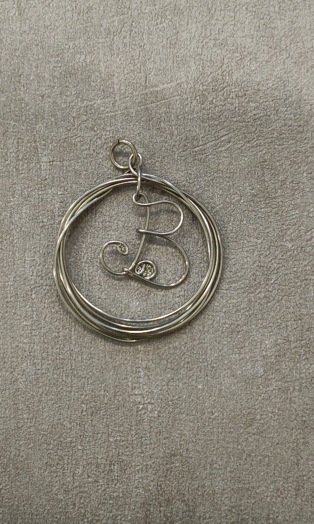 Initial Pendent (Category: Handmade Craft) located in Singapore. Submitted by artiris (Listing ID 1341695651, Image 1). Description: Handmade with stainless steel wire, one of a kind. The price is for each initial. You're welcome for customizing.