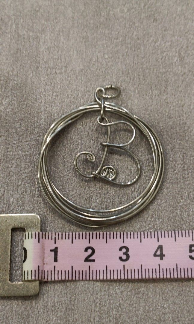 Initial Pendent (Category: Handmade Craft) located in Singapore. Submitted by artiris (Listing ID 1341695651, Image 2). Description: Handmade with stainless steel wire, one of a kind. The price is for each initial. You're welcome for customizing.