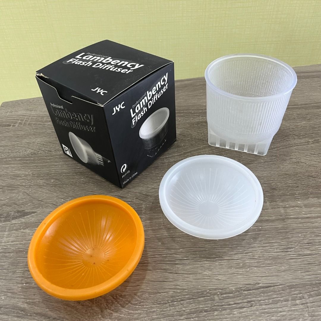 Lambency Flash Diffuser (Category: Flashes) located in Bayan Lepas. Submitted by kathychong (Listing ID 1341632712, Image 1). Description: Unused JYC Lambency Flash Diffuser Set - Fits Nikon Flash SB600-SB800 or any flash with dimension W = 62-65mm and Height = 39-42mm Condition : 10/10 https://monsterpiggy.boutir.com/item/JYC-Professional-Lambency-Flash-Diffuser/6372535520460800?lang=en.