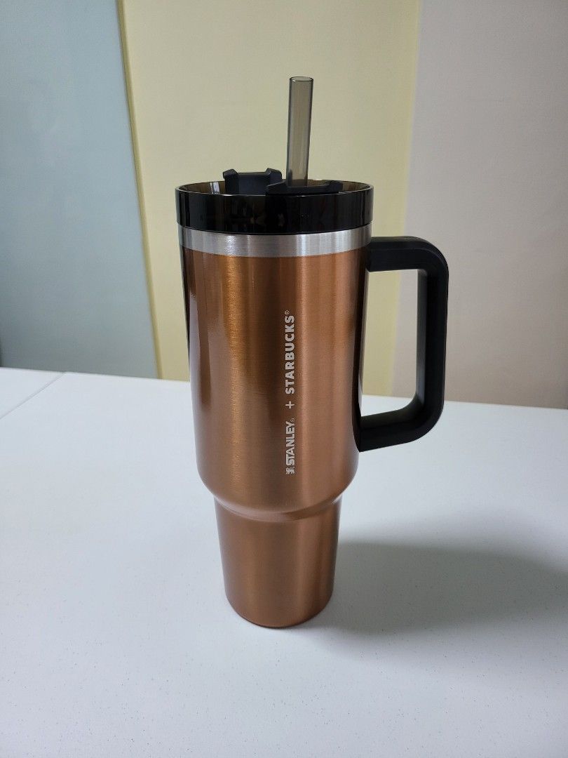Stanley x Starbucks Thailand Copper 40oz tumbler (Category: Water Bottles & Tumblers) located in Singapore. Submitted by bcgymlover (Listing ID 1341688026, Image 1). Description: Clearing out my space. Selling this Stanley x Starbucks Thailand Copper 40oz tumbler at cost price (1800THB). Came with a box for protection..