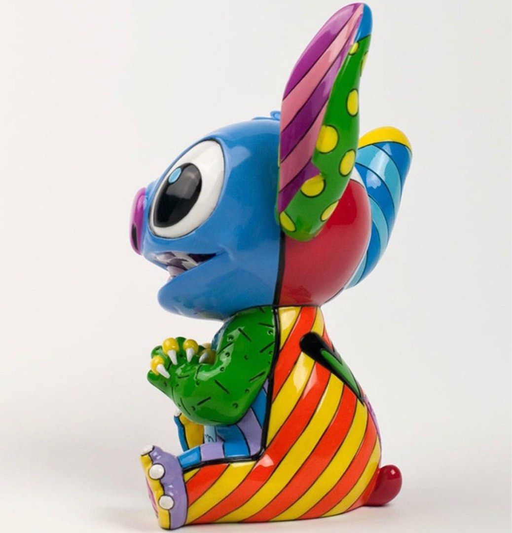 Stitch Disney by Britto Large Figurine (Category: Collectibles) located in Melbourne. Submitted by bocotee (Listing ID 1341594746, Image 2). Description: Stitch Disney by Britto Large Figurine CONDITION : NEW PRICE : $149 STITCH LARGE FIGURINE Take home your favorite fun-loving extraterrestrial lifeform with this whimsical and cheery figurine. Romero Britto captures Stitch with accurate detail and colorful stripes and polka dots that really make 