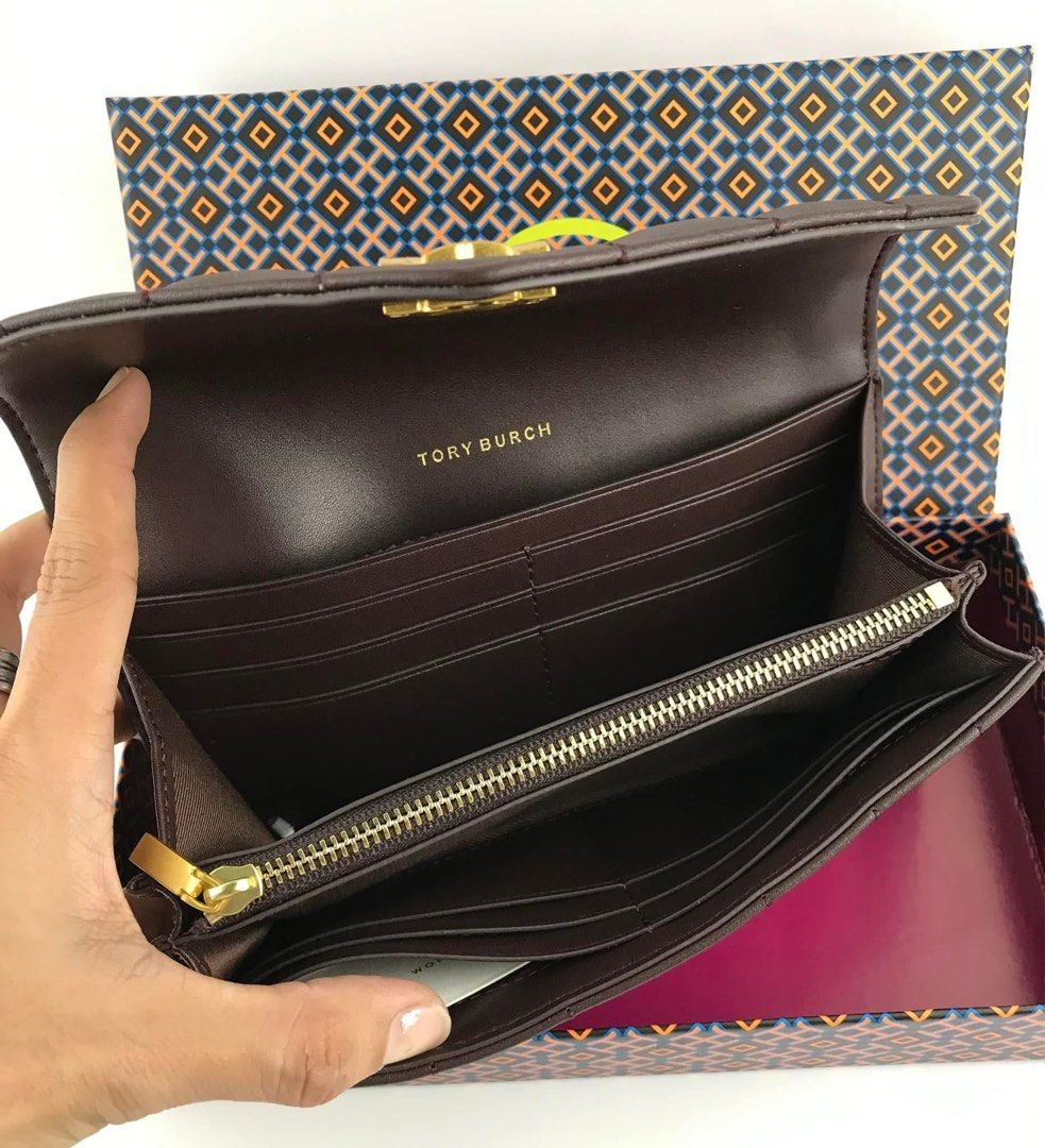 Tory Burch envelope wallet (Category: Wallets & Card holders) located in Manila. Submitted by gff.daily_flower (Listing ID 1341588379, Image 3). Description: With tag dustbag box and paperbag.