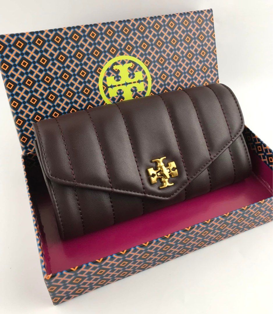 Tory Burch envelope wallet (Category: Wallets & Card holders) located in Manila. Submitted by gff.daily_flower (Listing ID 1341588379, Image 1). Description: With tag dustbag box and paperbag.