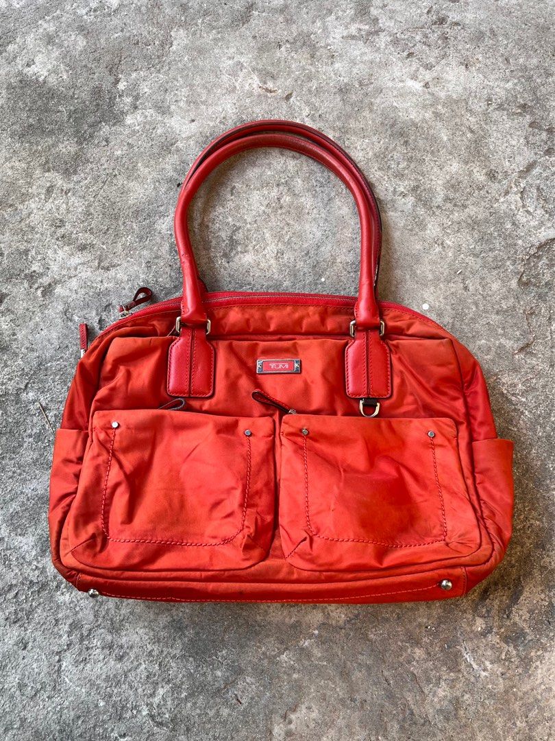 Tumi mini duffle bag (Category: Luxury Bags & Wallets) located in Subic. Submitted by n_nocturnal (Listing ID 1341674928, Image 1). Description: Good condition 8/10 Sign of usage Check all photos to see condition .