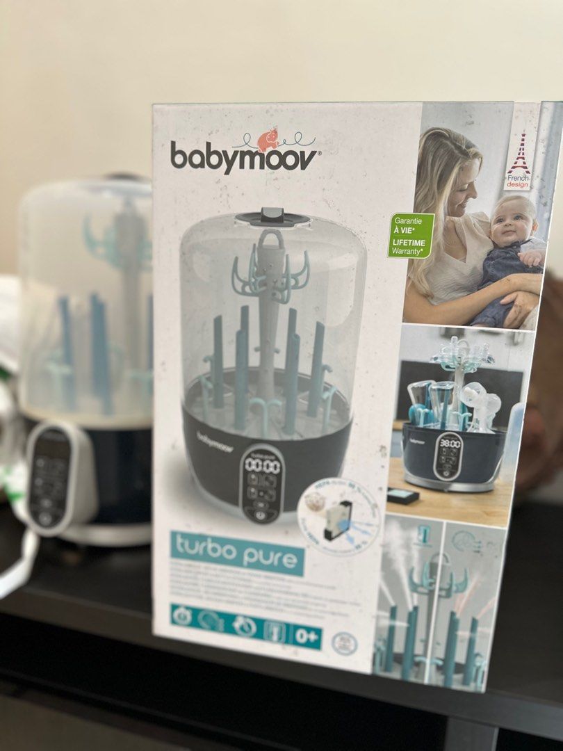 Baby Moov Turbo Pure (Category: Weaning & Toddler Feeding) located in Valenzuela. Submitted by jaylight (Listing ID 1341791622, Image 3). Description: • Baby bottles are completely hygienic in an ultra-purified environment • Eliminating even the most resistant bacteria (99%), and attacks unpleasant odors and calcium build-ups from milk • Purifying ‘Pure Drying’ function to protect bottles from humidity and eliminate 99% of airborne pollutants suc