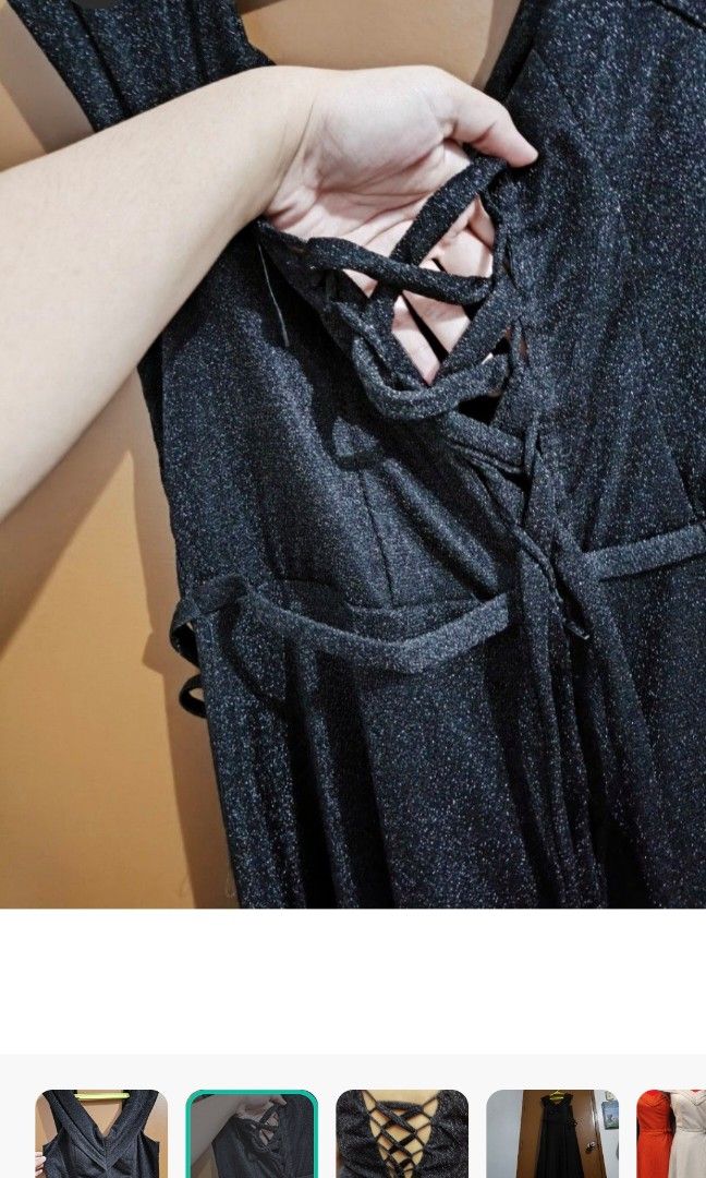 Black glittery dress (Category: Evening dresses & gowns) located in Las Pinas. Submitted by fishbowling (Listing ID 1341799430, Image 2). Description: Black glittery dress(2XL) with v-neck in front and tie design at the back Condition: Good as new (used only once) Length ~133 cm / 52.5 inches Waist: up to 35 inches Bust up to 40 inches (padded already) With ribbon at the back, adjustable with zipper at the back.