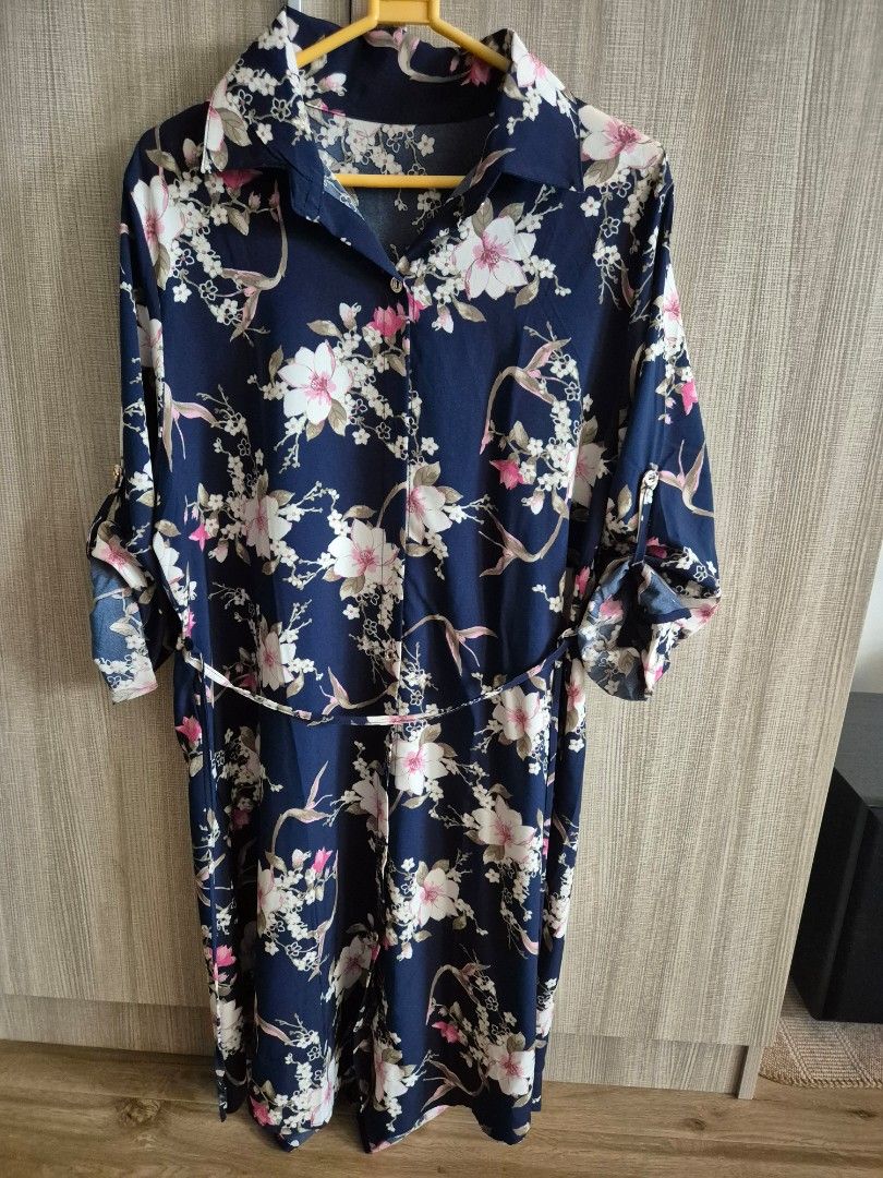 Blue floral dress (Category: Dresses) located in Las Pinas. Submitted by fishbowling (Listing ID 1341793847, Image 1). Description: Never used (wrong size). Can fit size 1x-2x. Maganda tela and the color and print are very elegant..