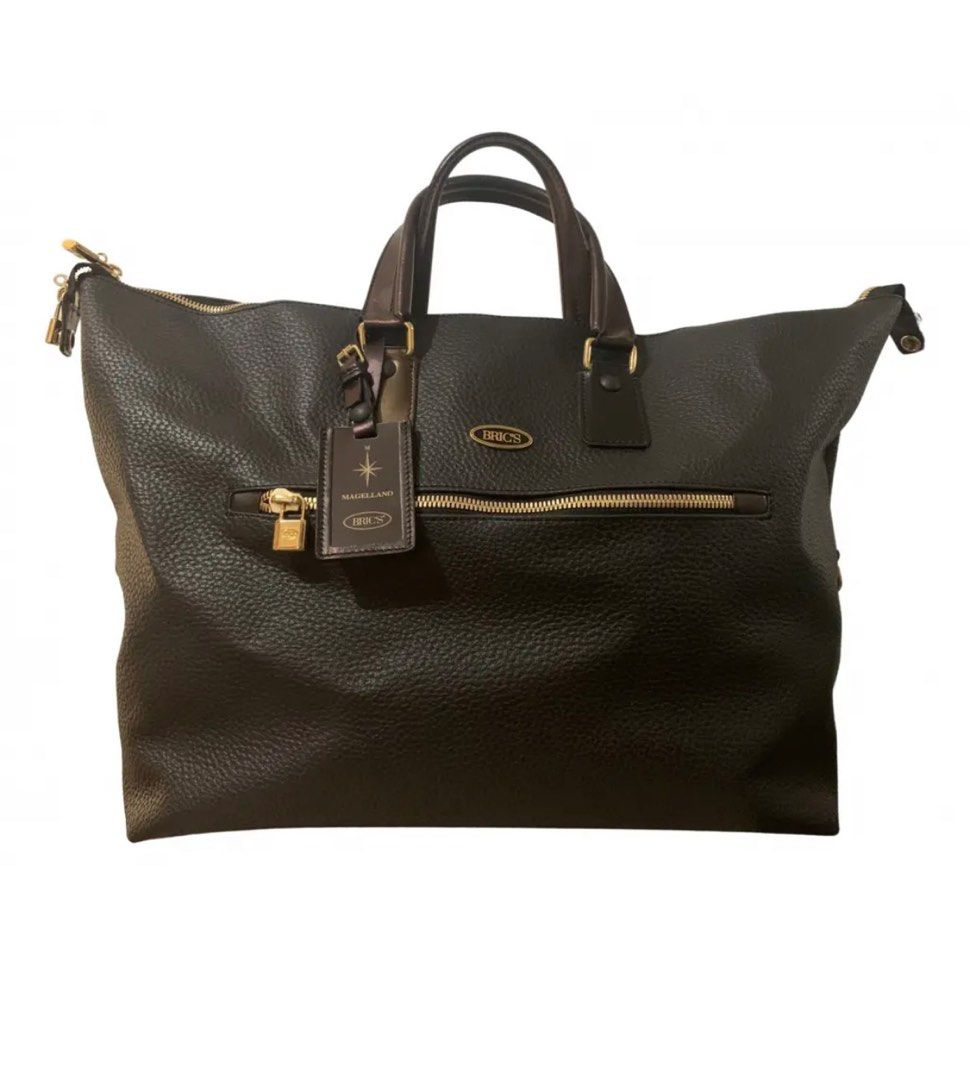Brics Leather Travel Bag (Category: Bags & Wallets) located in Singapore. Submitted by sherryoncloud9 (Listing ID 1341774909, Image 1). Description: Material: Cowhide, full-grain leather. Leather age-ware signs: the leather is a natural cowhide with some natural stretch marks. Lining: The inner lining is a grosgrain signature canvas, Metal: brass metal gold-tone studs, zip puller, locks, and clasps Features: Outer: One zipped pocket and a securel