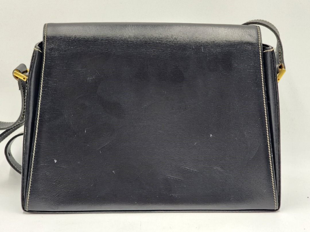 Christian Dior CD Logo Plate Trapezoid Crossbody Shoulder Bag (Category: Bags & Wallets) located in Melbourne. Submitted by designercollectibles.com.au (Listing ID 1341837401, Image 2). Description: Condition: Good. As this is a pre-loved item, there are scratches and tarnish on the hardware and general signs of wear. Please check the condition carefully from these pictures. Since this is a preloved item, there is a possibility that it has underg
