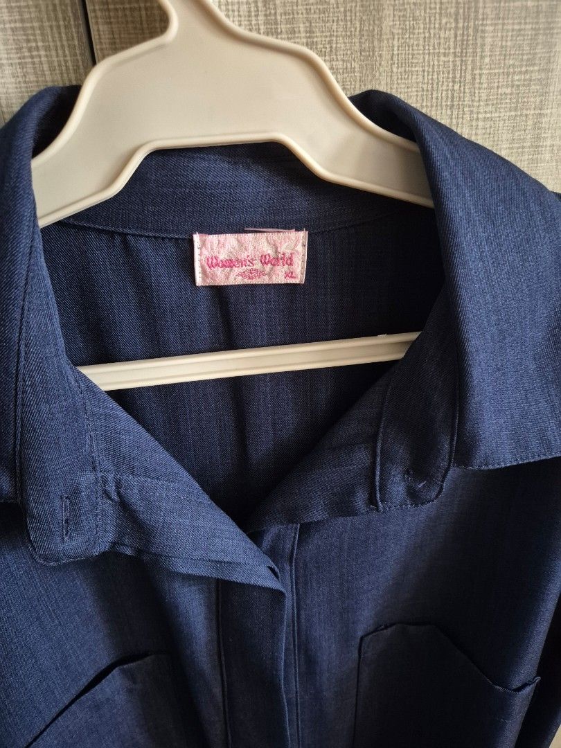 Dark blue dress (Category: Dresses) located in Las Pinas. Submitted by fishbowling (Listing ID 1341796355, Image 1). Description: Dark blue dress, never used, washed and stored only. Bought in SM Dept store for 700+. RFS: wrong size :( Great for corporate wear. Tela is thick, cool, and very high quality..
