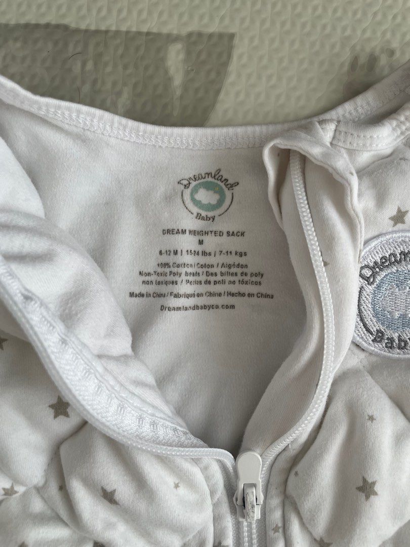 Dreamland Weighted Sleep Sack (Category: Babies & Kids Fashion) located in Cavite. Submitted by nering (Listing ID 1341785166, Image 3). Description: Dreamland Weighted Sleep Sack • Size: Medium 6-12 M | 15-24 lbs | 7-12 kgs • Has a minimal yellow stain at the bottom part (see the picture) • Got this for P3,600 • FREE Halo Sleep Sack Multi-way Swaddle (see the last photo).